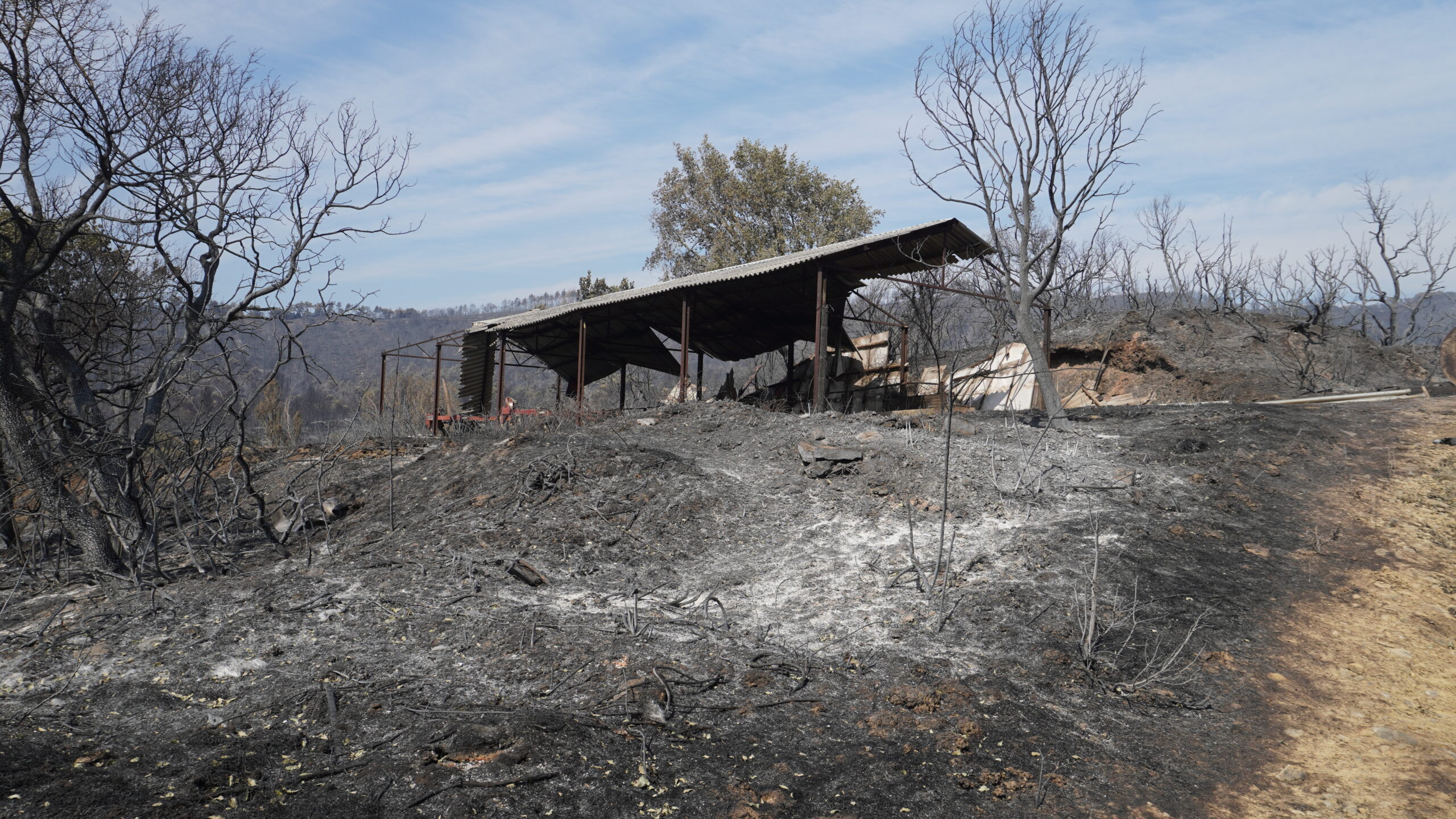 Completely burnt building in the mountains