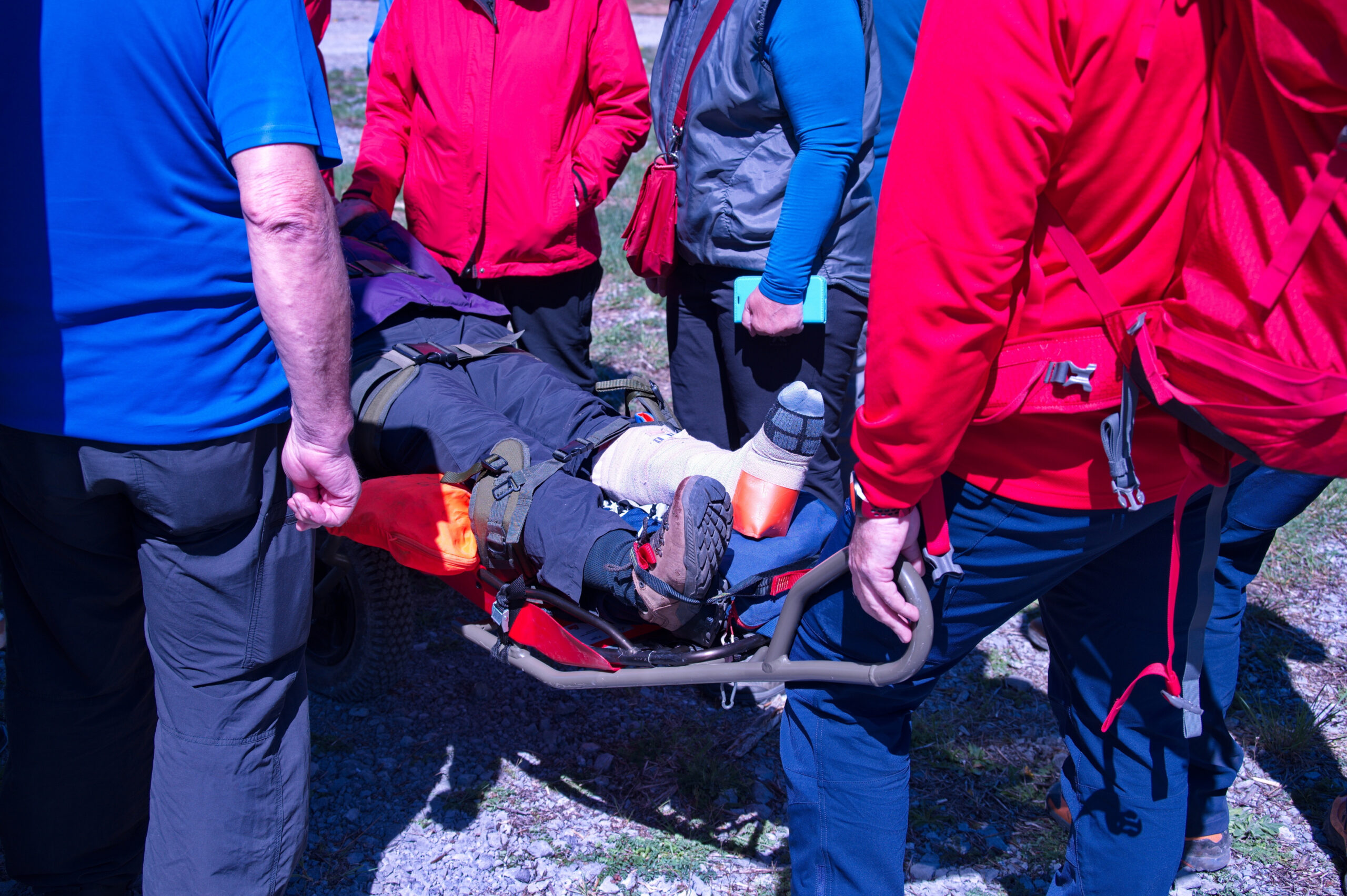 Paramedics from mountain rescue service provide first aid